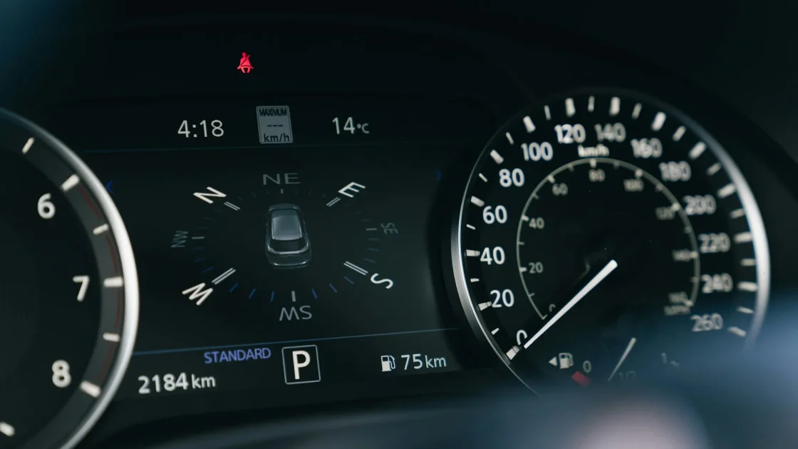 A car instrument cluster showing several amber driver-assistance warning symbols illuminated at once.